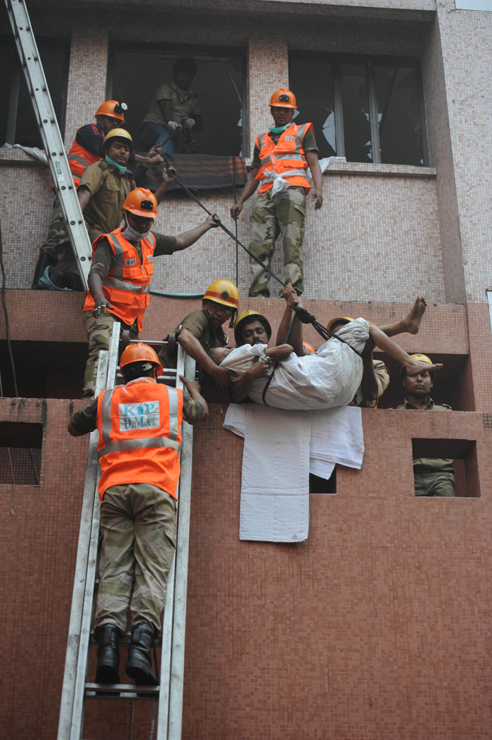 A fire tore through a seven-storey private hospital in the eastern Indian city of Kolkata before dawn on Friday, killing at least 89 people, most of them intensive care patients who were asleep and suffocated in the fumes.