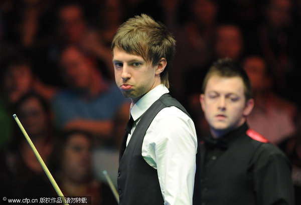 England's Judd Trump (left) looks back at the table during the final during the williamhill.com UK Championships at the Barbican Centre, York.