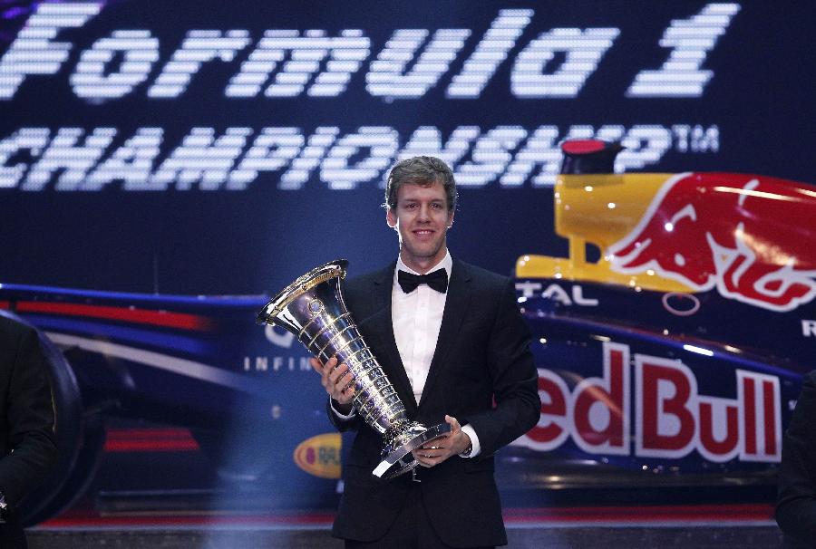 Sebastian Vettel has been awarded the FIA Academy championship trophy for Motor Sport at the annual FIA prize-giving gala in Delhi, Dec. 9, 2011. (Xinhua/Reuters Photo)