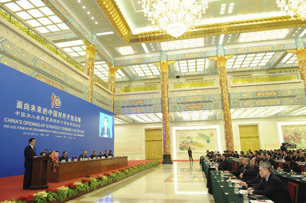 Chinese President Hu Jintao delivers a speech during the high level forum on the 10th anniversary of China's accession to the World Trade Organization in Beijing, capital of China, Dec. 11, 2011. [Xinhua photo]