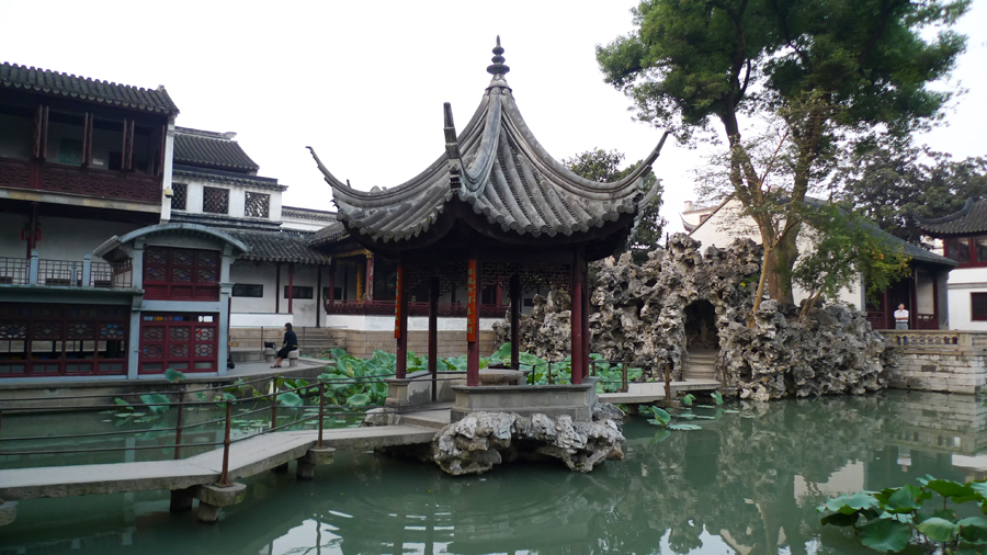 Located at the northeast of Suzhou, Jiangsu Province, the Lion Grove Garden is famous for the Taihu rocks in various shapes which are said to resemble lions, especially the large and labyrinthine grotto of rocks at the garden's center. It is recognized with other classical Suzhou gardens as a UNESCO World Heritage Site. [Photo by Xu Lin / China.org.cn]