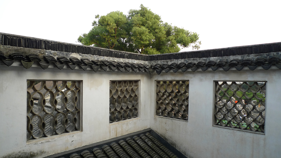 Located at the northeast of Suzhou, Jiangsu Province, the Lion Grove Garden is famous for the Taihu rocks in various shapes which are said to resemble lions, especially the large and labyrinthine grotto of rocks at the garden's center. It is recognized with other classical Suzhou gardens as a UNESCO World Heritage Site. [Photo by Xu Lin / China.org.cn]