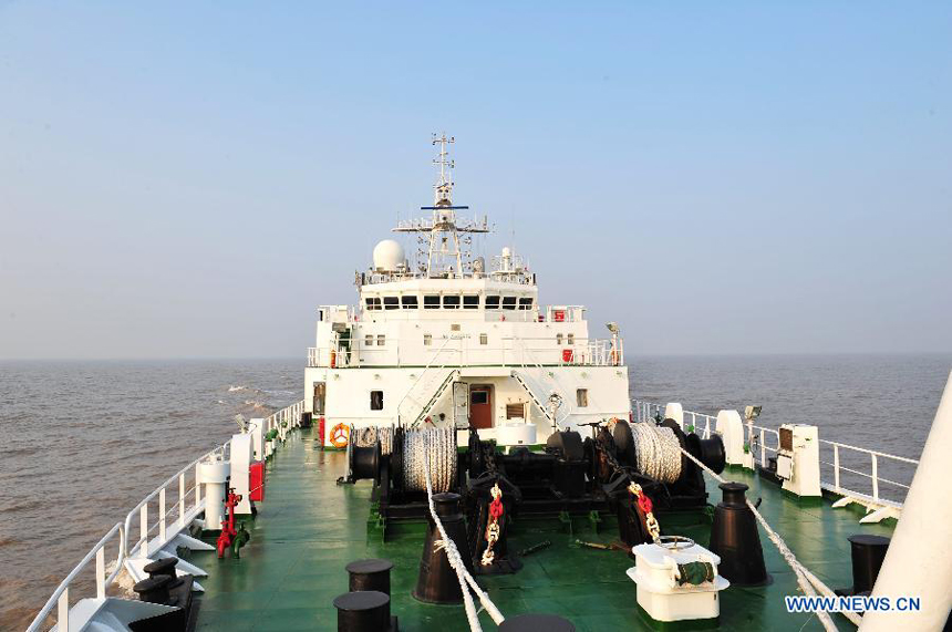 The 3,000-tonnage-class marine surveillance ship 'Haijian 50' sails on the Yangtze River near Shanghai, east China, Dec. 13, 2011. China on Tuesday sent its largest patrol ship 'Haijian 50' to the East China Sea for its maiden voyage. 