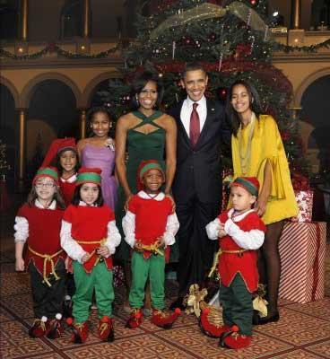 The Obamas celebrated the holiday season with musical stars Justin Bieber, Cee Lo Green, Jennifer Hudson, Victoria Justice and the Band Perry at the 30th annual &apos;Christmas in Washington&apos; concert Sunday night.