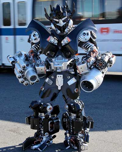 Transformer fan: Peter Kokis, 49, has spent 675 hours meticulously creating 'Brooklyn Ironhide' out of household items from his New York home. [Agencies]