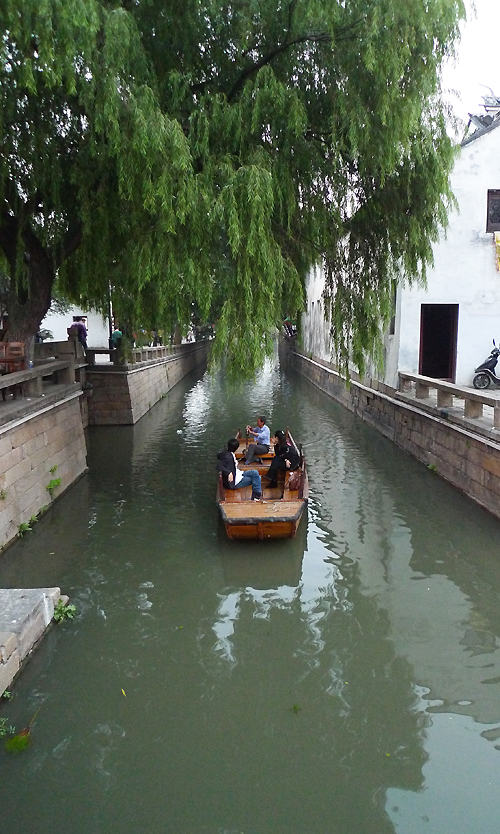 Located in downtown Suzhou, Jiangsu Province, Pingjiang Street is a historical road along the river, where the city's history and unique feature have been well-preserved. As early as in Song Dynasty, the street had already existed, which was shown on Suzhou's earliest map 'Pingjiang Map' as one of the main streets of the town during that time. For many centuries, the street has become a center of much of Suzhou's cultural life. [Photo by Xu Lin / China.org.cn]