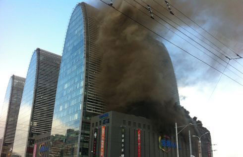 Fire breaks out near Xizhimen Thursday in downtown Beijing.