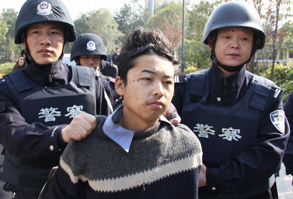 Bombing Suspect Held In Robbery Plot - China.org.cn