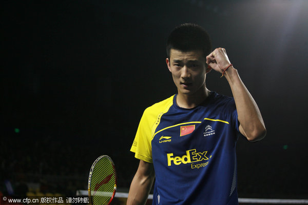 Chen Long of China celebrates after defeating Lee Chongwei of Malaysia on Saturday to set up an all-Chinese men's singles final against teammate Lin Dan at the BWF World Superseries Finals.