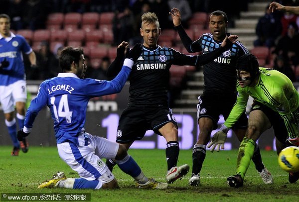 Jordi Gomez of Wigan Athletic scores an equalising goal during the Barclays Premier League match between Wigan Athletic and Chelsea at the DW Stadium on December 17, 2011 in Wigan, England.