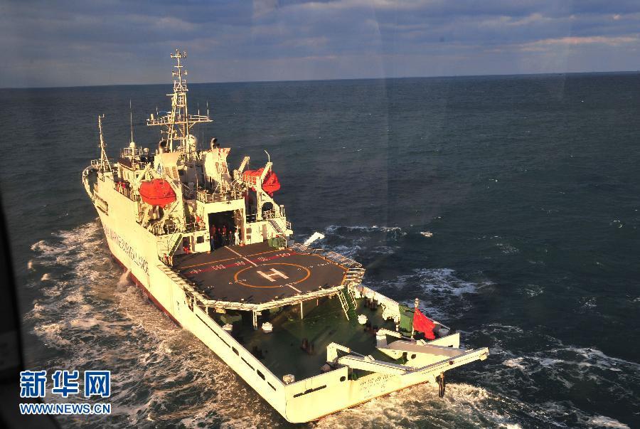 China's patrol ship 'China Marine Surveillance 50' is waiting for return after completing its task in the East China Sea on Dec. 17, 2011. A regular joint sea and air patrol has been launched for the first time, involving 'China Marine Surveillance B-7115' helicopter and two ocean surveillance ships 'China Marine Surveillance 50' and 'China Marine Surveillance 66.' [Xinhua]