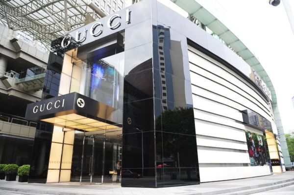 A Gucci flagship store is seen in Shenzhen, south China's Guangdong Province, Oct. 9, 2011. World luxury house Gucci raised the eyebrows in China as former employees with Gucci's Shenzhen flagship store complained about its 'unhumanitarian' work codes in an online posting, referring the luxury house as 'a sweat factory'. According to the posting published as early as September, Gucci's Shenzhen flagship store is accused to impose purported harsh regulations on worker's behaviors including prolonged and unpaid overtime, limited bathroom breaks, prohibition of having food or drinking water in the store during the rest time. Gucci has made no comment on the accusations. (Xinhua/Liang Xu) (ljh) 