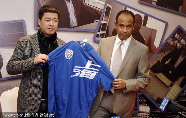 Tigana debuts as coach of Shanghai Shenhua soccer club at the press conference on December 18, 2011. 