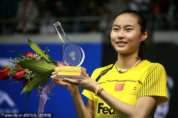 China's world No. 1 Wang Yihan beats India's Saina Nehwal to win the women's singles final of Superseries Finals in Liuzhou on December 18, 2011.