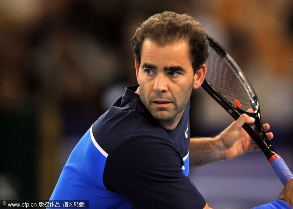  Pete Sampras played at 'Li Na and Friends' exhibition in Wuhan on Dec.18, 2011.