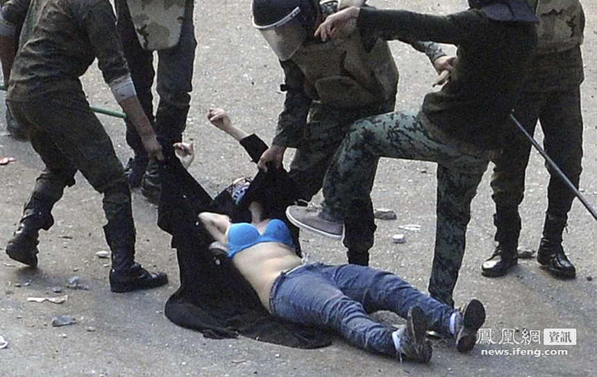 Photos and video posted on the web showed Egyptian troops pulling up the shirt of one woman protester in a conservative headscarf, leaving her half naked as they dragged her in the street on Saturday.