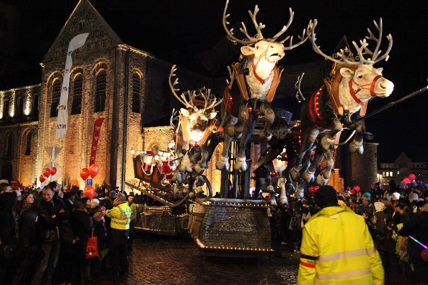 A reindeer float takes part in the Christmas float parade held in Nivelles, Belgium, Dec. 17, 2011. About 14 floats offered performance and candies to local residents and tourists Saturday night at the Christmas float parade in Nivelles.