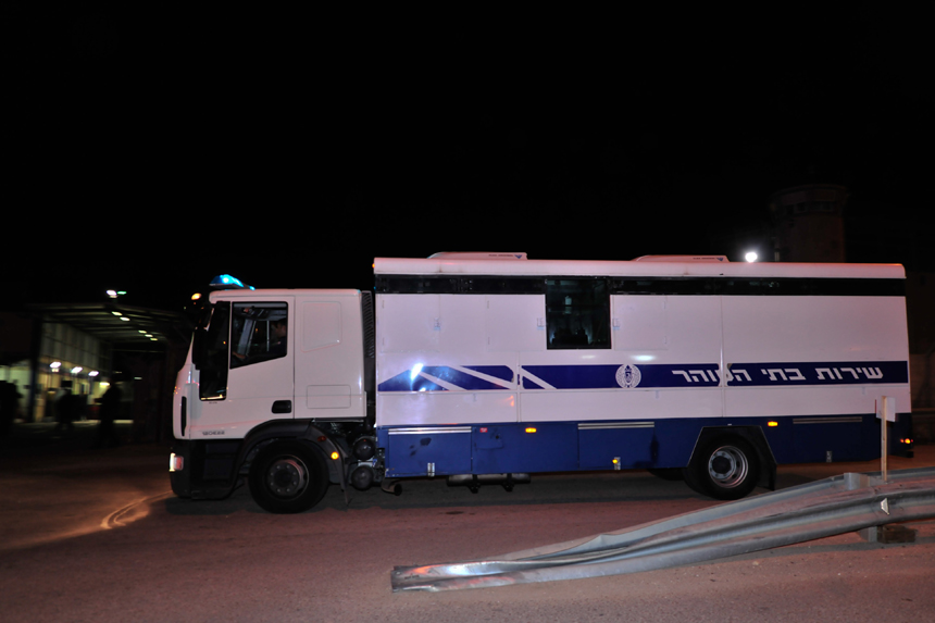A vehicle of Israel Prison Services delivering Palestinians to be released arrives at the Ofer prison, on Dec. 18, 2011. Israeli authorities on Sunday night released 550 Palestinians in the second half of a prisoner swap with Hamas.