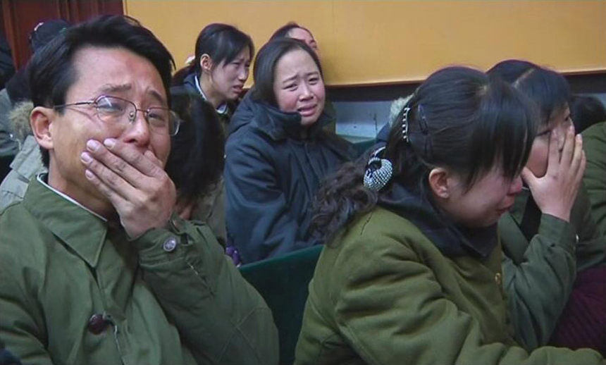 People of the Democratic People&apos;s Republic of Korea weep over the death of Kim Jong Il on Dec. 19, 2011. [Photo from sina.com.cn]