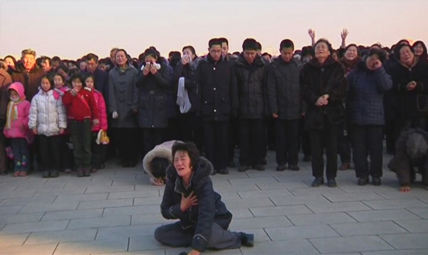 People of the Democratic People&apos;s Republic of Korea weep over the death of Kim Jong Il on Dec. 19, 2011. [Photo from sina.com.cn]