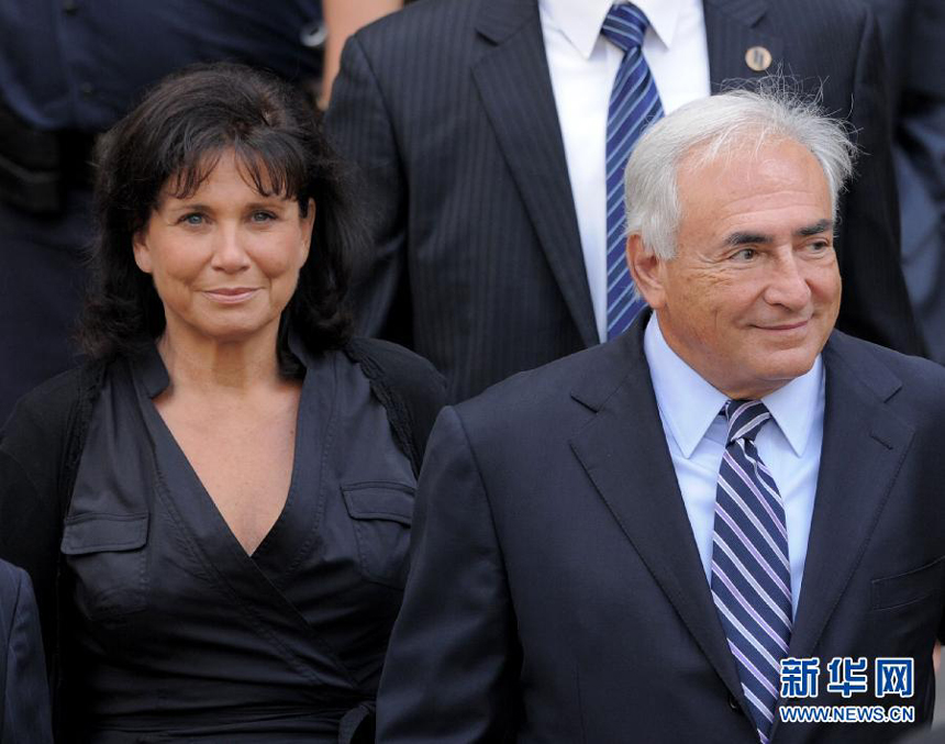 Dominique Strauss-Kahn's wife, Anne Sinclair, who stood by the former IMF boss as he battled sex assault allegations in New York and Paris, was named France's 2011 woman of the year in a poll, according to French magazine 'Terrafemina.' (Xinhua/AFP Photo) 