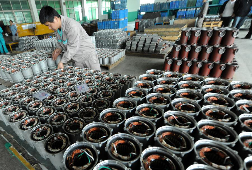 Photo taken on Dec. 1, 2011 shows an enterprise that produces and exports water pumps to Africa, ASEAN, and south America, in Daxi Town of Wenling City, east China's Zhejiang Province.