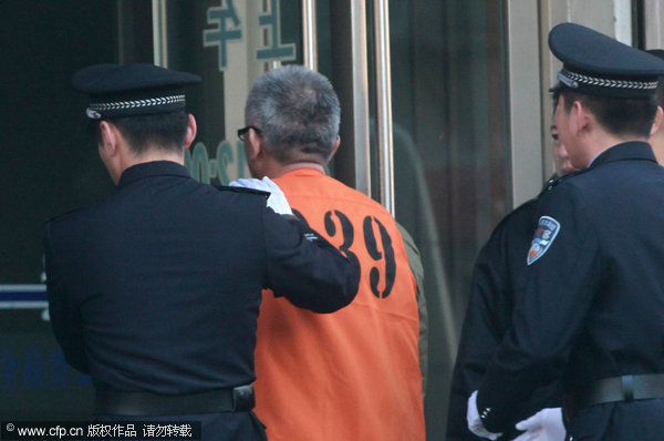  Yang Yimin was brought to court on Wednesday morning.