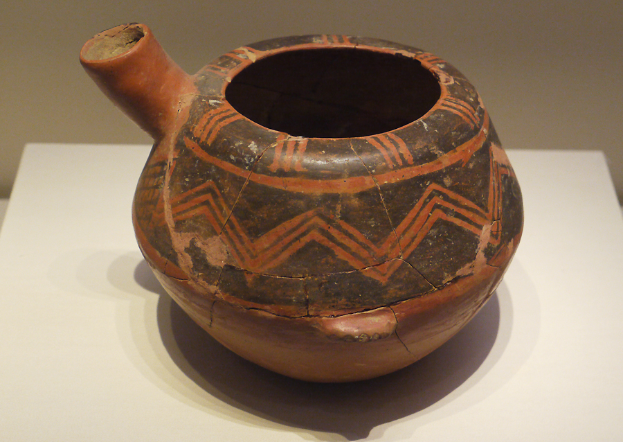 Painted Pottery He (water or wine vessel), Dawenkou Culture (c. 4200-2500 BC), unearthed at Dawenkou, Tai'an, Shandong Province, 1959 It is exhibited in the section of Life and Production in Neolithic China, an exhibition of Ancient China in the National Museum of China. [Photo by Xu Lin / China.org.cn]