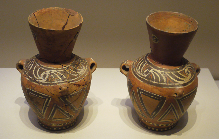 Painted Pottery Jars with Handles, Dawenkou Culture (c. 4200-2500 BC), unearthed at Dawenkou, Tai'an, Shandong Province, 1959. It is exhibited in the section of Life and Production in Neolithic China, an exhibition of Ancient China in the National Museum of China. [Photo by Xu Lin / China.org.cn]