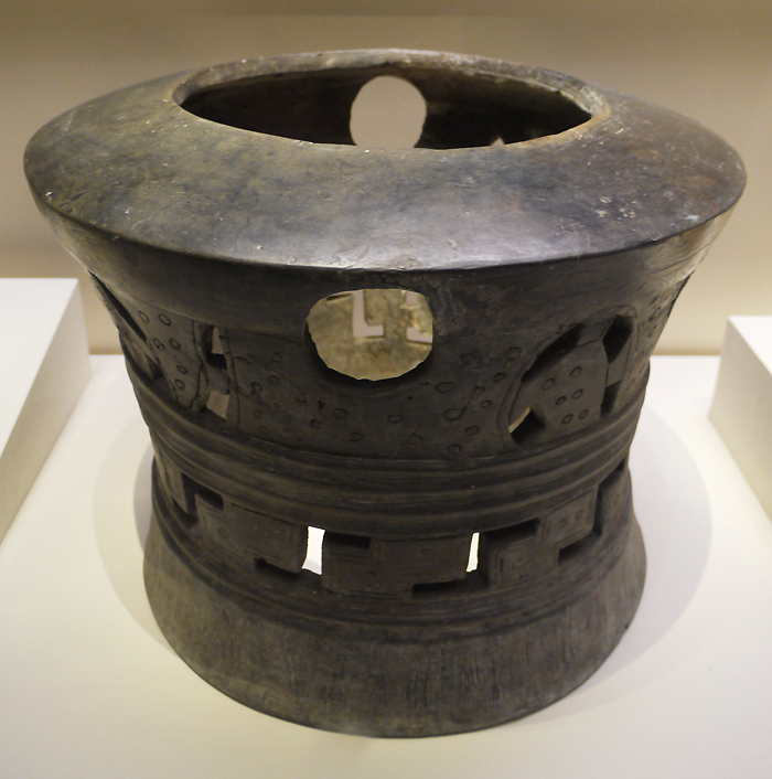 Openwork Pottery Stand, Wangwan Ⅲ Culture (c. 2500-1900 BC), unearthed at Wangwan, Luoyang, Henan Province, 1960. It is exhibited in the section of Life and Production in Neolithic China, an exhibition of Ancient China in the National Museum of China. [Photo by Xu Lin / China.org.cn]