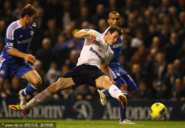 Gareth Bale of Tottenham Hotspur takes a shot at the goal during the Barclays Premier League match between Tottenham Hotspur and Chelsea at White Hart Lane on December 22, 2011 in London, England. 