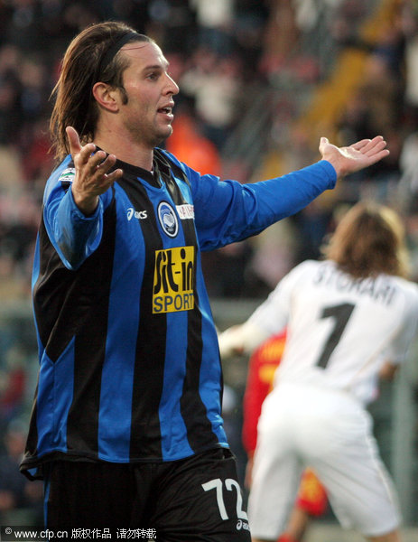 Former Atalanta captain Cristiano Doni celebrateD after scoring during a Serie A soccer match between Atalanta and Messina, at the Bergamo stadium in Italy on Dec. 10, 2006.