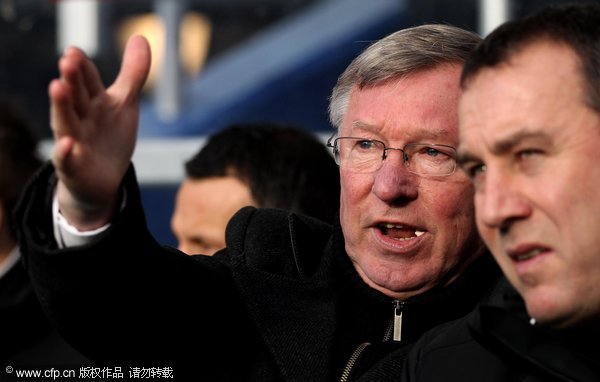 Sir Alex Ferguson the Manchester United manager looks on from the bench during the Barclays Premier League match between Queens Park Rangers and Manchester United at Loftus Road on December 18, 2011 in London, England. 