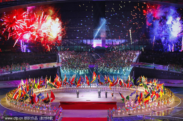 Images of fireworks is displayed on a huge screen at the opening ceremony of the 26th Universiade Games at Shenzhen Bay Sports Center in shenzhen, China, on Friday, Aug. 12, 2011.