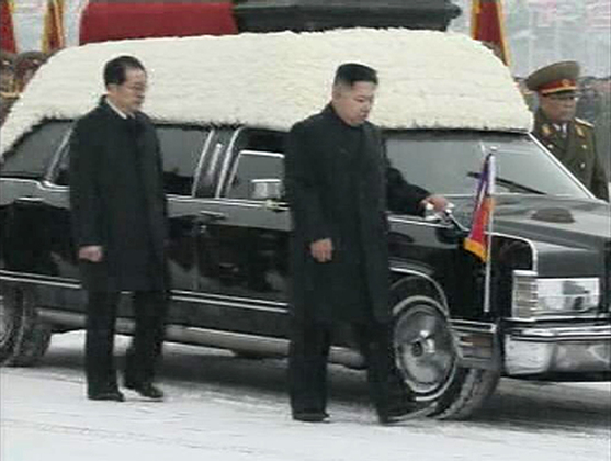 Kim Jong Un (R) Wednesday bid farewell to his father Kim Jong Il.