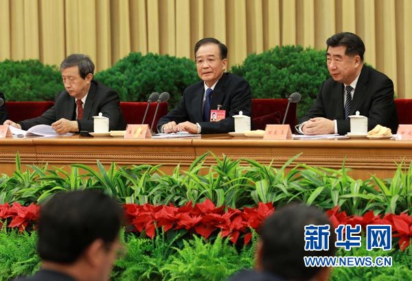 Premier Wen Jiabao(C) was speaking at the opening of the annual central conference on rural work in Beijing Tuesday.[Photo/Xinhua]