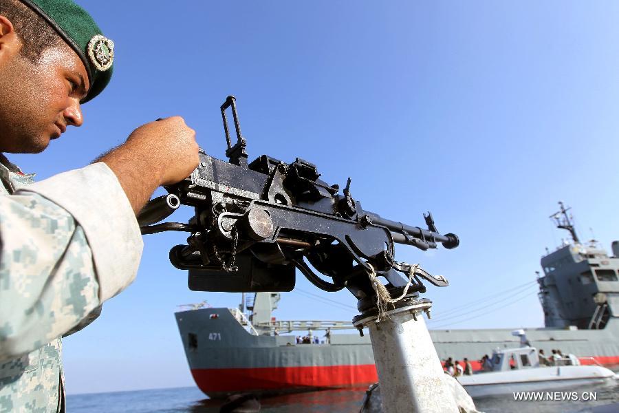 A soldier attends Iranian naval maneuvers dubbed Velayat 90 on the Sea of Oman, Iran, Dec. 28, 2011. [Ali Mohammadi/Xinhua]