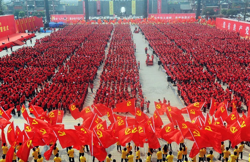 Tens of thousands of Communist Party of China (CPC) members sing red songs (revolutionary songs) on March 28, 2011, to celebrate the 90th anniversary of the founding of the CPC in Chongqing. 