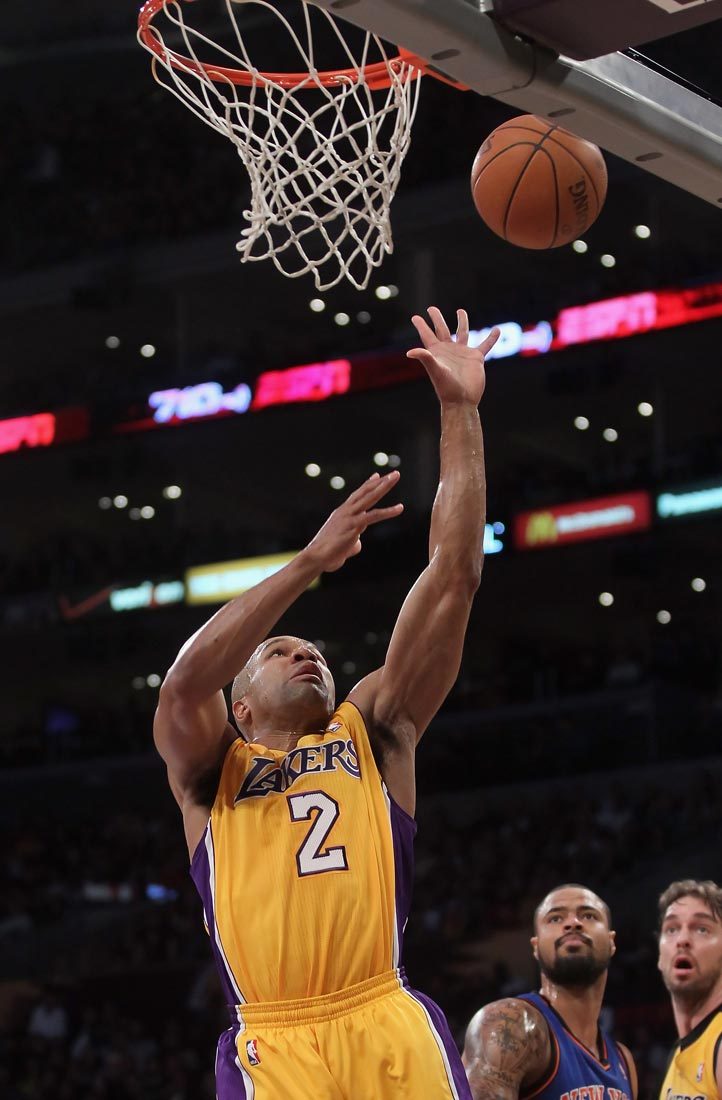 Derek Fisher of the Los Angeles Lakers goes up for a layup in the first half against the New York Knicks at Staples Center on December 29, 2011 in Los Angeles, California.