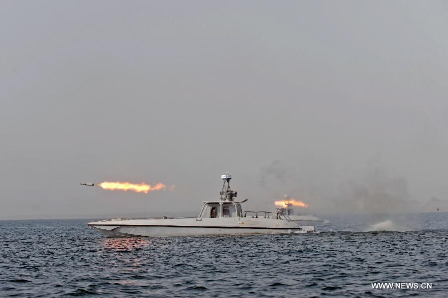 An Iranian warship fires a missile during naval maneuvers dubbed Velayat 90 on the Sea of Oman, Iran, Dec. 30, 2011. [Ali Mohammadi/Xinhua] 
