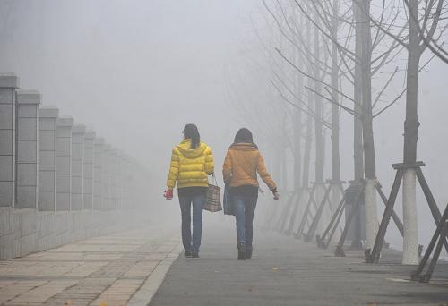 cold snap brings china into 2012 with fog, rainfa