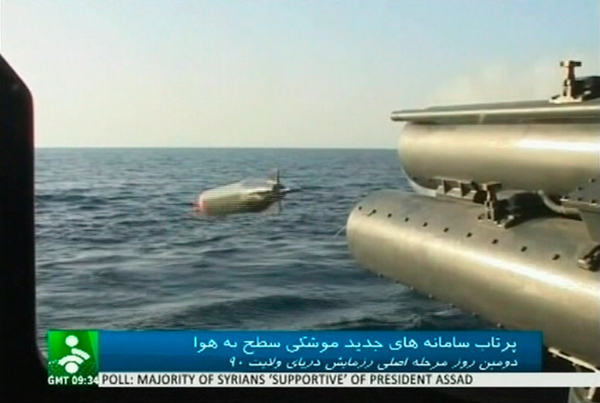An Iranian warship launches a missile in an unknown location in this still image taken from footage released by Islamic Republic of Iran News Network, Jan 1, 2012. [China Daily] 