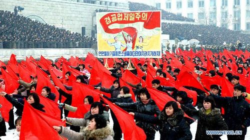 People attend a mass rally at the Kim Il Sung Square in Pyongyang, the Democratic People's Republic of Korea (DPRK) on Jan. 3, 2012. [Xinhua/KCNA] 