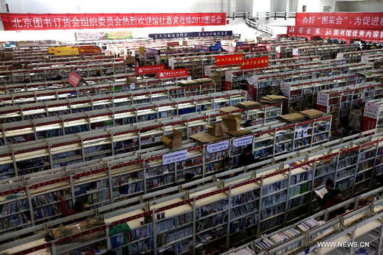Photo taken on Jan. 9, 2012 shows a scene of the 2012 Beijing Book Expo at the China International Exhibition Center in Beijing, capital of China. A total of 762 publishing enterprises and book wholesalers participated in the four-day book expo. (Xinhua/Jin Liwang)