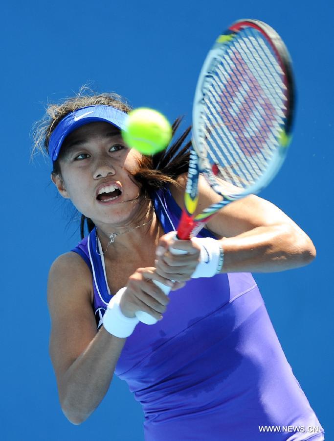 Zhang Shuai of China hits a return in the 1st round women's singles match against Aleksandra Wozniak of Canada at 2012 Australian Open tennis tournament at Melbourne Park in Melbourne, Australia, on Jan. 17, 2012. Zhang Shuai lose 0-2. (Xinhua/Bai Xue) 
