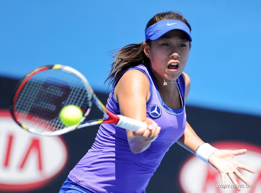 Zhang Shuai of China hits a return in the 1st round women's singles match against Aleksandra Wozniak of Canada at 2012 Australian Open tennis tournament at Melbourne Park in Melbourne, Australia, on Jan. 17, 2012. Zhang Shuai lose 0-2. (Xinhua/Bai Xue) 