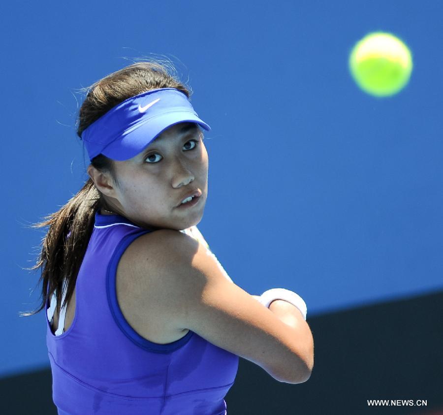 Zhang Shuai of China hits a return in the 1st round women's singles match against Aleksandra Wozniak of Canada at 2012 Australian Open tennis tournament at Melbourne Park in Melbourne, Australia, on Jan. 17, 2012. Zhang Shuai lose 0-2. (Xinhua/Bai Xue) 