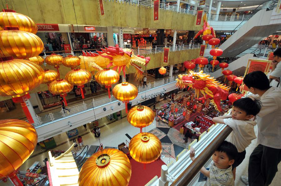 A shopping plaza is decorated with the well-designed dragon decoration to celebrate the upcoming Chinese Lunar New Year in Kuala Lumpur, Malaysia, Jan. 16, 2012. Chinese Lunar New year, or the Spring Festival, falls on Jan. 23 this year. 