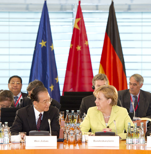 Chinese Premier Wen Jiaobao and German Chancellor Angela Merkel co-chaired the first round of China-Germany inter-government consultation in Berlin on June 28, 2011. [Photo: fmprc.gov.cn]