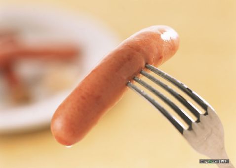 A research shows that eating one sausage a day or two rashers of bacon raises the risk of pancreatic cancer by a fifth. [Agencies]